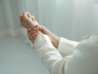 A young business woman has severe pain in her wrist. She has numb