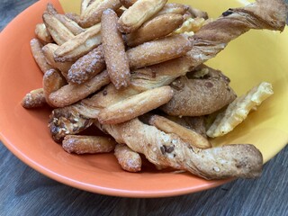 Various dry biscuits lie on a plate