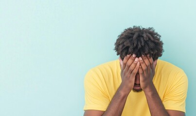 Young African American Man Experiencing Stress in Minimalist Room During Daytime - Emotional Struggle and Mental Exhaustion