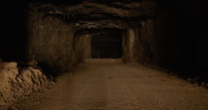 Dark, spooky cave - Steady cam movement backwards