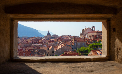 View through the fort window to old town in Dubrovnik, Dalmatia, Croatia.