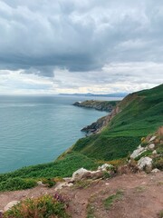 peninsula with greenery and clouds