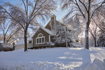 Contemporary house with large windows right after a very big snow storm in Minneapolis Minnesota