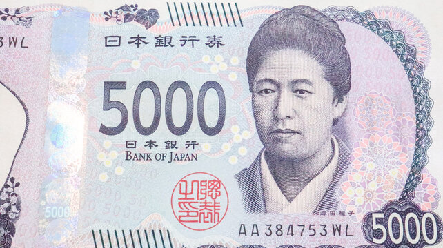 Very close up of the New Japanese 5000yen Banknote with Umeko Tsuda , Tokyo, Japan