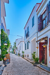 Bozcaada, Colorful streets with old beautiful houses and bright flowers,