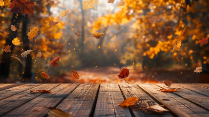 a wooden table top in the foreground. with vibrant orange and yellow leaves falling gently. Autumn
