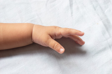 Obraz premium Close-up photo of baby's hand