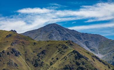 mountain landscape with blue sky and clouds