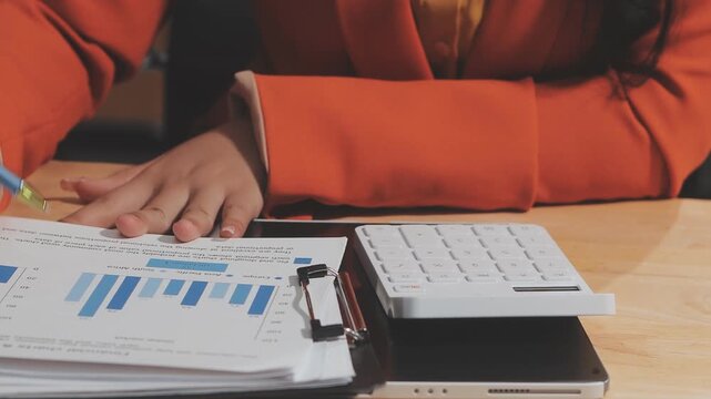 Business Documents, Auditor businesswoman checking searching document legal prepare paperwork or report for analysis TAX time,accountant Documents data contract partner deal in workplace office