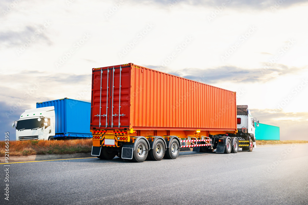 Wall mural Semi Trailer Trucks Driving on The Road with The Sunset. Shipping Cargo Container, Economical Transportation Business. Commercial Truck Transport. Diesel Truck. Logistics Freight Truck Transportation.