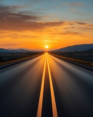 Fototapeta premium A serene sunset view over a long stretch of road, inviting travelers into the beautiful horizon and warm evening light.