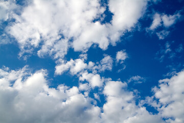 Fototapeta premium Blue sky with white clouds. Bright blue sky with clouds.