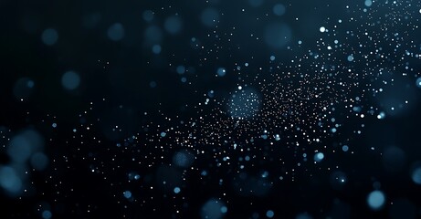 Fototapeta premium Abstract bokeh background of defocused blue lights on a dark background.