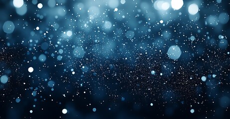 Obraz premium Abstract blue bokeh background with white lights and sparkles.