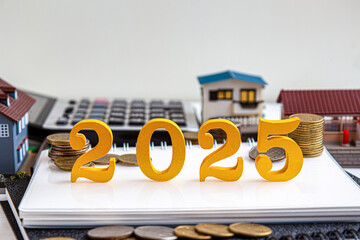 2025 saving growth and business investment concept with home and green nature background.