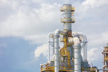 Chimney of Petrochemical Petroleum Refinery Oil and Gas plant industrial complex building with...