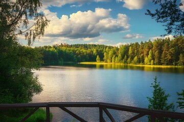 Obraz premium Beautiful landscape with forests, lake and blue sky. Recreational area for sports and entertainment.
