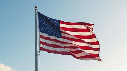 American flag waving proudly against a clear sky, symbolizing freedom, patriotism, and national pride. Perfect for celebrating USA heritage and spirit.