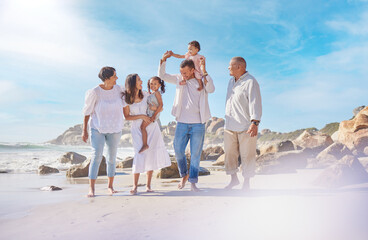 Happy, big family and outdoor at beach, fun and grandparents on vacation with group for bonding....