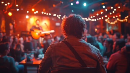 Man Watching Live Music Performance in a Bar.