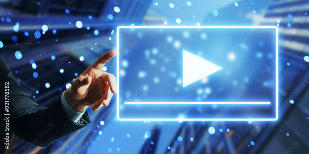 Aufkleber close up of male hand pointing at creative digital play button on blurry bokeh circles city backgrou