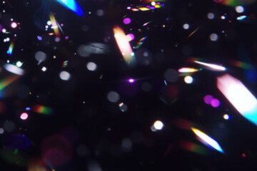 Black background with colorful lights, light beams, blurry cinematic sparkling in the air, glitchcore, glowy iridescence bokeh sparkles. Festive light leak overlay