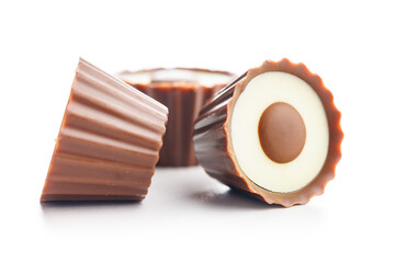 Sweet pralines. Chocolate truffles isolated on white background.