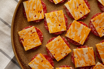 Gourmet Cheese Meat and Crackers on a Plate, top view. Close-up.