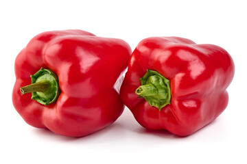 Red ripe bell peppers, isolated on white background.