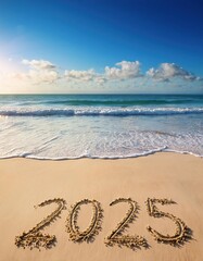  2025 year written on sandy beach sea at sunny day