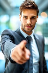 Confident Businessman Pointing at the Viewer.