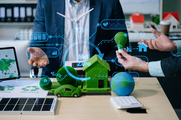 Business team people planning hand using laptop for working technology and business Net zero and...