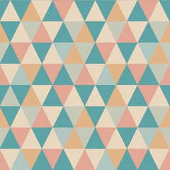Seamless pattern of tessellating triangles in a spectrum of pastel shades