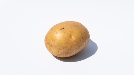 Isolated Potato on a Plain White Surface