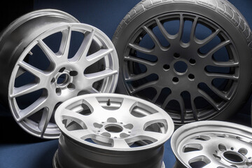 Obraz premium stylish sports black bronze gray silver car rims elongated welded blue light for tuning and drift competition