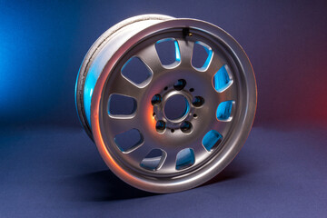 old car wheels titanium rims long exposure video on dark background spinning motion simulation