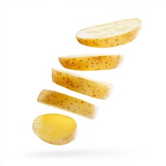 Close up of potato slices in the air on an isolated white background
