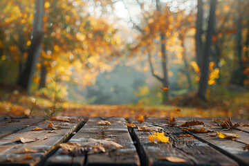 Empty table top and blurred autumn trees and colorful leaf background for display or montage your products