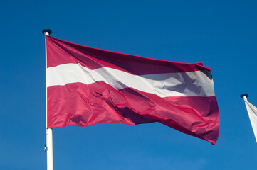 General stock - Latvian flag fluttering in the wind.