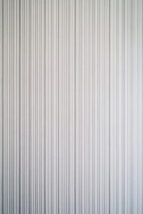 ミニマリズムな縦の白いラインパターンの縦画像
