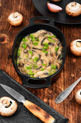Mushrooms in creamy sauce.