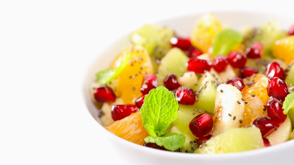 delicious fresh fruit salad on white background