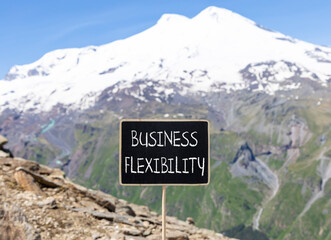 Business flexibility symbol. Concept words Business flexibility on beautiful yellow blackboard....