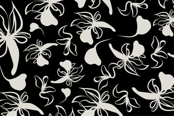 Black and white flower pattern design for fabric and clothes textile.  soft white abstract flowers contrast sharply against a black background