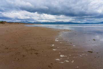 A cloudy spring afternoon on Llanddwyn beach in Anglesey, Wales.