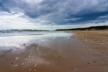 Storm clouds over  Llanddwyn beach on Anglesey, Wales.