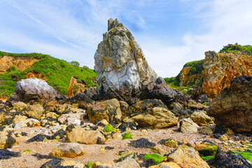 The White Lady, or Ladi Wen, sea stack on Porth Padrig beach, Anglesey, Wales.