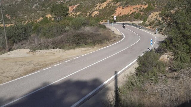 Rider during a motorcycle trip in a mountain road