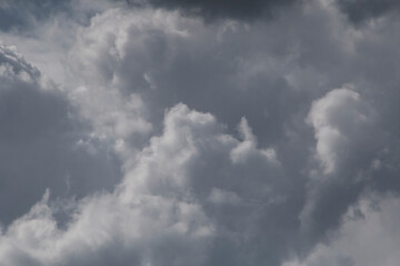 close up of fluffy rain clouds in a sky