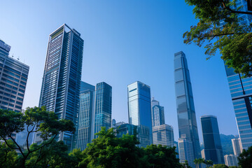 Skyscrapers Viewed from Below with Blue Sky and White Clouds